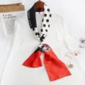 Detailed view of chic black white red polka dot narrow silk scarf with elegant pattern. - Cat & Polka Dots, Red