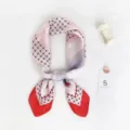 Fashionable pink grid silk scarf main display, elegant neckerchief styled flat lay image. - Red Trim Contrast