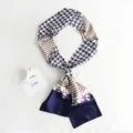 Elegant silk twilly scarf featuring classic houndstooth and chain pattern with solid blue ends. - Houndstooth, Dark Blue