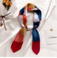 Abstract color block skinny silk feel scarf variant in elegant navy and warm red tones. - Graffiti Red