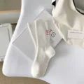 Calzini a costine bianchi donna tinta unita con ricamo al tacco stile ins casual - Taglia unica / 1 Paio / Bianco