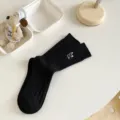 Schwarze gerippte Socken für Damen mit süßer Hundebestickung, lässige Alltagskleidung. - Einheitsgröße / Schwarz