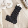 Dark grey knitted leg warmers, winter cozy stirrup socks, stylish ribbed calf boot cuffs. - Dark Gray