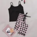Women's two-piece pajama set featuring a black lace camisole and pink plaid pants for sleep. - S / Top And Bottom / Pink and Black Plaid