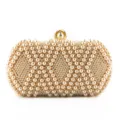 Exquisite handmade pearl evening clutch bag detail, elegant beaded texture for formal events. - Pink