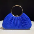 Blue satin pleated evening clutch bag detail, elegant circular metal handle design for party. - Blue
