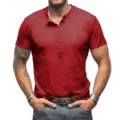 Detailed view of the red men's short sleeve henley t-shirt, showing texture and muscle fit. - Burgundy