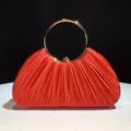 Red satin pleated evening clutch bag with elegant gold round metal handle for women party - Red