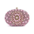Εκπληκτική οβάλ βραδινή τσάντα clutch με λαμπερά ροζ στρας και όμορφο λουλουδάτο σχέδιο. - Ροζ