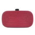 Red woven PU leather clutch bag detail shot, elegant evening handbag with black clasp. - Burgundy