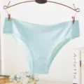 Close up of light blue seamless ice silk women panties, minimalist underwear detail view style. - M / Sky Blue
