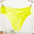 Close-up detail of seamless neon green women's panties, smooth ice silk fabric, comfortable. - M / Fluorescent Green