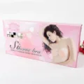 Silicone invisible bra packaging box variant display, featuring nude push-up adhesive cups. - Pink Tone Elegant Box Style