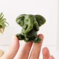 Natural jade elephant figurine, hand-carved gemstone animal decor for desktop office. - Xiu Jade Elephant (Sitting) / Approx 5x5cm