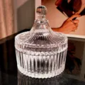 Clear ribbed glass storage jar with lid, elegant decorative candy container for home decor tabletop. - Vertical Stripe Embossed Storage Jar with Lid