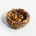 Handmade resin bird nest ornament with crystal Easter eggs for home decor tabletop display. - Yellow + Tiger Eye (Easter Egg Style) / 8cm Diameter 4cm Height (With Black Box)