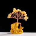 Natural yellow crystal money tree ornament featuring a golden fish base for home decor. - Citrine