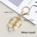 Natuurlijke witte kristallen hart vormige sleutelhanger tas hanger met gouden accenten. - Hartvormige witte kristalkralen van 10 mm / Lengte 7.5cm (Hart 10x10mm)
