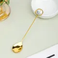 Gold stainless steel stirring spoon with white marble heart crystal decor for dessert coffee - Howlite / Approx 1.5cm Heart