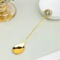 Gold dessert spoon featuring a lovely natural crystal heart charm, elegant tableware decor. - Dalmatian Jasper / Approx 1.5cm Heart