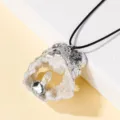 Natural crystal geode stone pendant necklace with silver plated edge and black cord. - Slab Agode with White Single Crystal