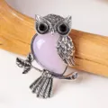 Vintage silver owl pendant with pink crystal belly and black eyes, elegant retro jewelry piece. - Rose Quartz Owl Pendant / Rose Quartz