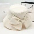 Cappello a secchio donna estivo protezione solare anti-UV tesa larga con grazioso fiocco - Stile con Fiocco e Spacco / Beige