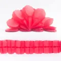 Red paper clover garland detail view for party decoration and wedding backdrop setup. - Red