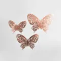 Détail d'autocollants muraux papillon 3D rose gold ajourés avec des motifs floraux délicats. - Style C / Or rose