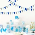 Detailed view of 3m large glitter bunting flags hanging decoration for birthday party setup. - Dark Blue + Light Blue + Silver
