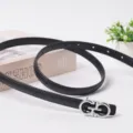 Close-up of black thin leather belt with silver metal buckle, stylish accessory detail. - 100cm / Black