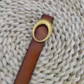 Classic brown leather belt for women with elegant gold buckle, perfect detail shot for daily wear. - 100cm / Yellow Brown