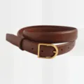 Close-up detail of premium brown leather belt with elegant gold buckle for women. - Caramel Gold Buckle