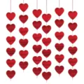 Detail shot of red heart hanging string decorations, glitter and metallic finish garlands. - 6 Strings