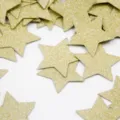 Gold glitter star confetti close-up view, ideal for wedding party and birthday decorations. - Glitter Gold Stars (Approx. 20g/Pack)