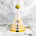 Detailed shot of a pink cone birthday hat with a gold sequin top ball for party decor. - Double Gold Lines on Pink (Sequin Ball)