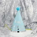 Close-up detail of the blue party hat detail with silver stripes on sparkling sequin backdrop. - Light Blue with Double Silver Borders (Pom-Pom)