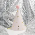 Pink kids birthday party hat with shiny gold stars and fluffy pink pom pom decoration. - Stars on Pink (Pom-pom Ball)