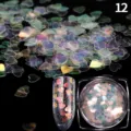 Detailansicht holografischer Herz-Nagelapplikationen im runden Glas für DIY-Nagelkunst. - 1g Packung Nr. 12