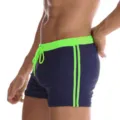 Men's stylish square leg swim trunks with neon green drawstring and side stripe details. - Fluorescent Green