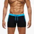 Mens swim trunks variant, black and blue boxer brief style with adjustable drawstring. - M / Black