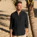 Detailed view of men's casual long sleeve linen beach shirt in black, showcasing texture and fit. - S / Tops / Black