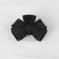 Matte black bow hair claw clip, elegant minimalist design for secure updo. Everyday accessory. - 10cm / Black