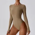 Close-up view of the slim-fit khaki long sleeve bodysuit, showing soft stretch fabric texture. - S / Camel Brown