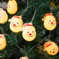 Guirlanda de luces LED de Papá Noel variante para decoración de árbol festiva cálida. - Muñeco de nieve sonriente / 3m 20 Luces a Batería
