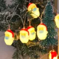Christmas LED string lights with Santa Claus pendants, perfect for holiday tree decoration. - Mask Santa
