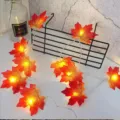 LED maple leaf string lights variant display, warm glowing artificial autumn leaves decor. - Orange-Red Maple Leaves