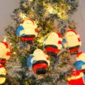 Christmas LED Santa Claus string lights for tree decoration, festive holiday warm glowing decor. - Santa Claus with Bag