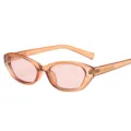 Transparente orangefarbene Katzenaugen-Sonnenbrille mit rosa Gläsern, modische Brille. - Champagnerfarbener Rahmen / Teebraune Gläser