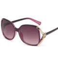 Classic oversized round fashion women sunglasses with gradient lenses and elegant pearl camellia detail. - Transparent Purple Frame / Gradient Grey Lens